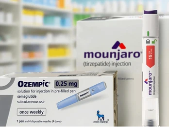 Mounjaro tirzepatide injection pen with an Ozempic box and syringe on a pharmacy counter.